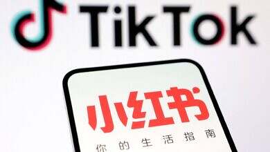 Illustration shows TikTok and RedNote logos